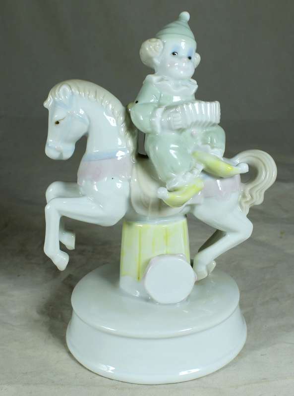 Clown on Carousel Horse