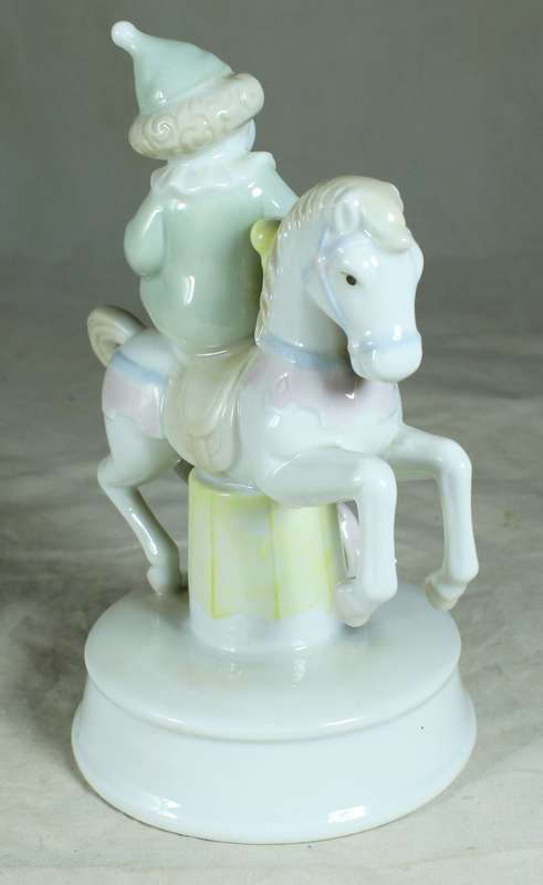 Clown on Carousel Horse