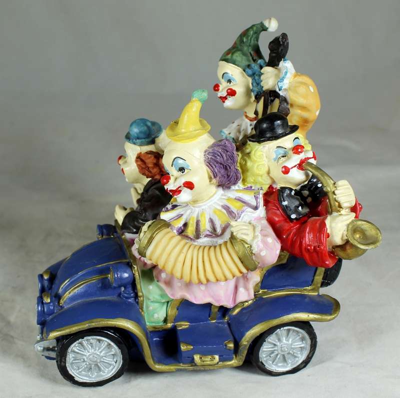 4 Musical Clowns in Open Car