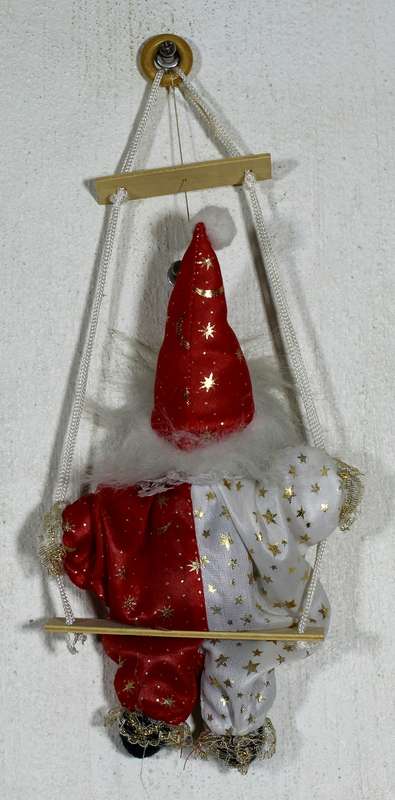 Clown in Red & White on Swing