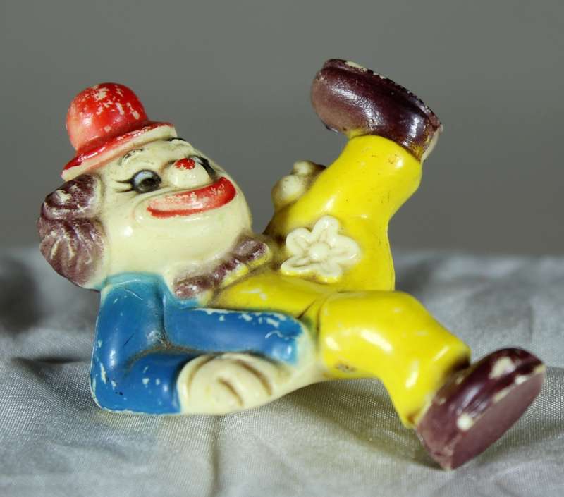 Clown with leg in air