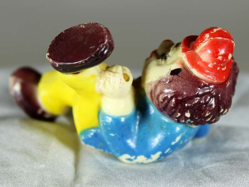 Clown with leg in air