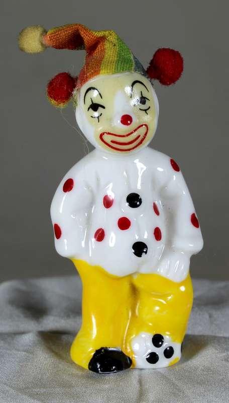 Sad clown with material hat