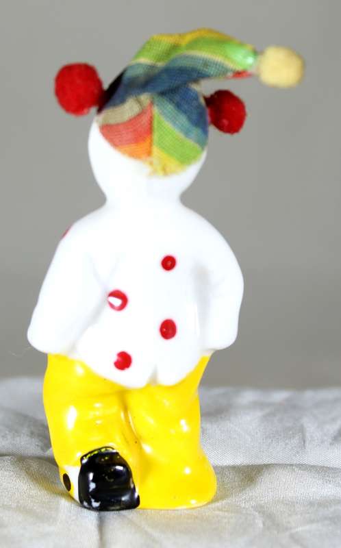 Sad clown with material hat