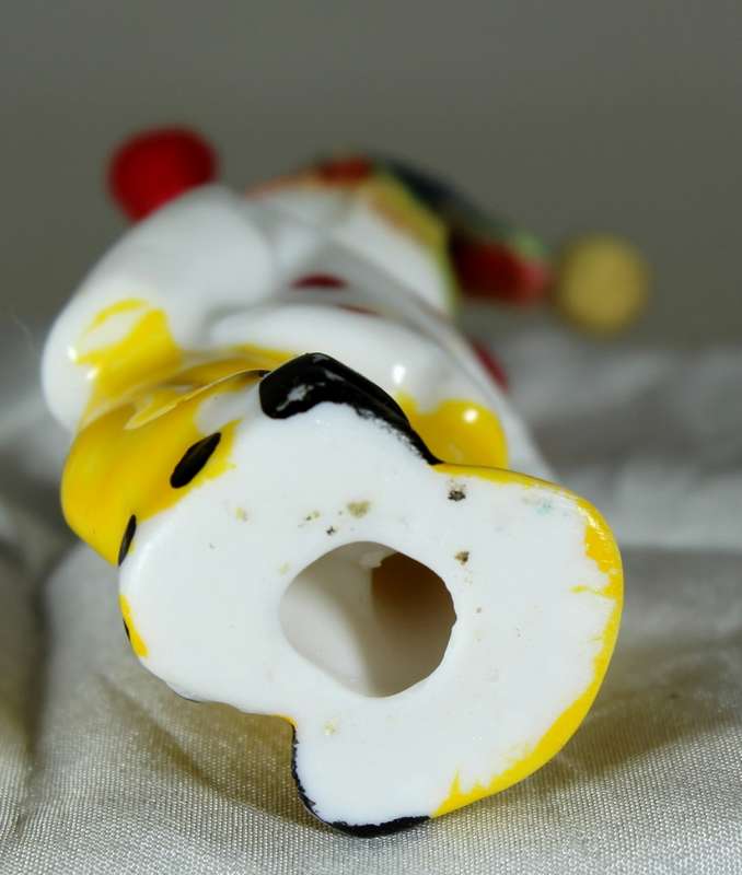 Sad clown with material hat