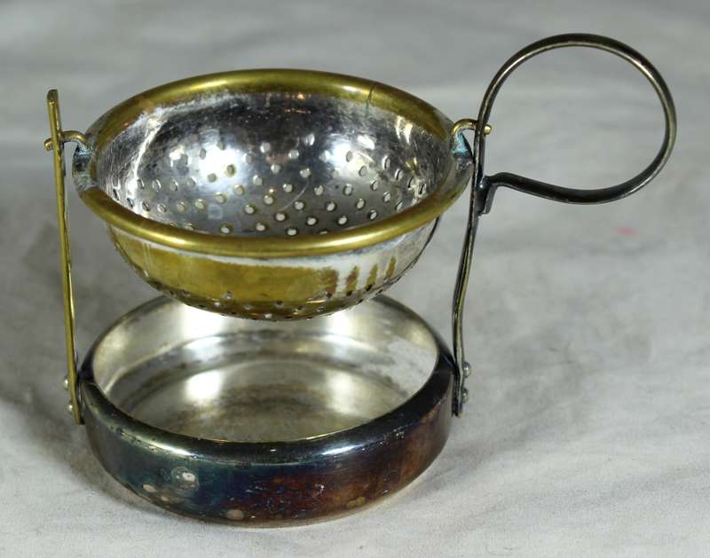 Vintage silver plated English tea strainer with swivel & drip tray