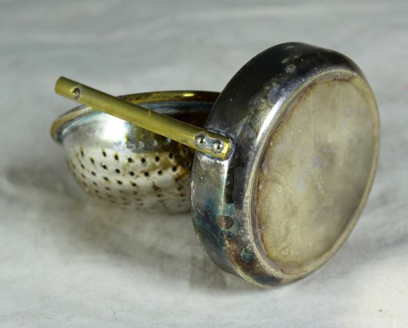 Vintage silver plated English tea strainer with swivel & drip tray