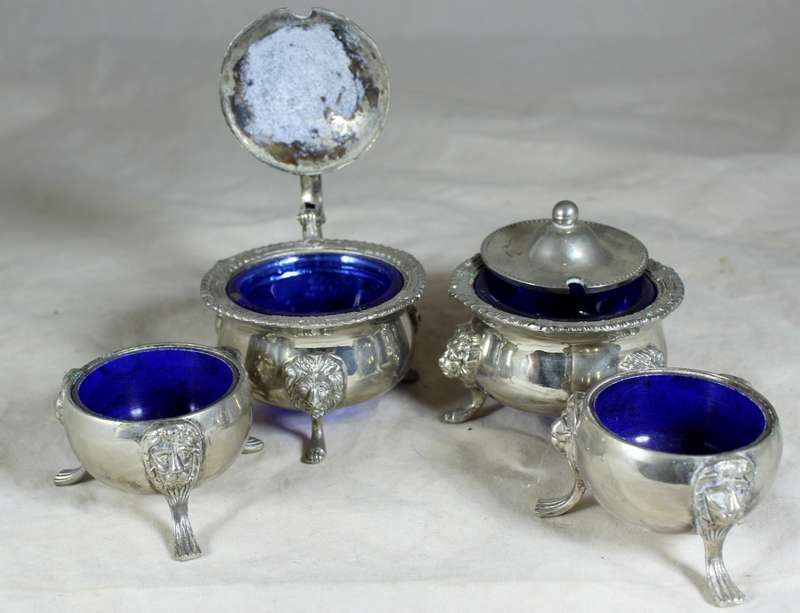 Set of 4 silver plated condiment holders with blue glass liners