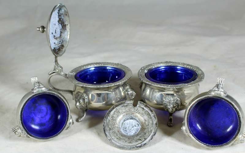Set of 4 silver plated condiment holders with blue glass liners