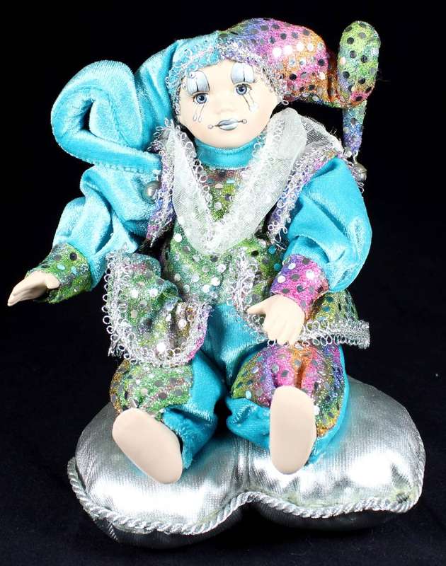 Wind-up gypsy girl on cushion