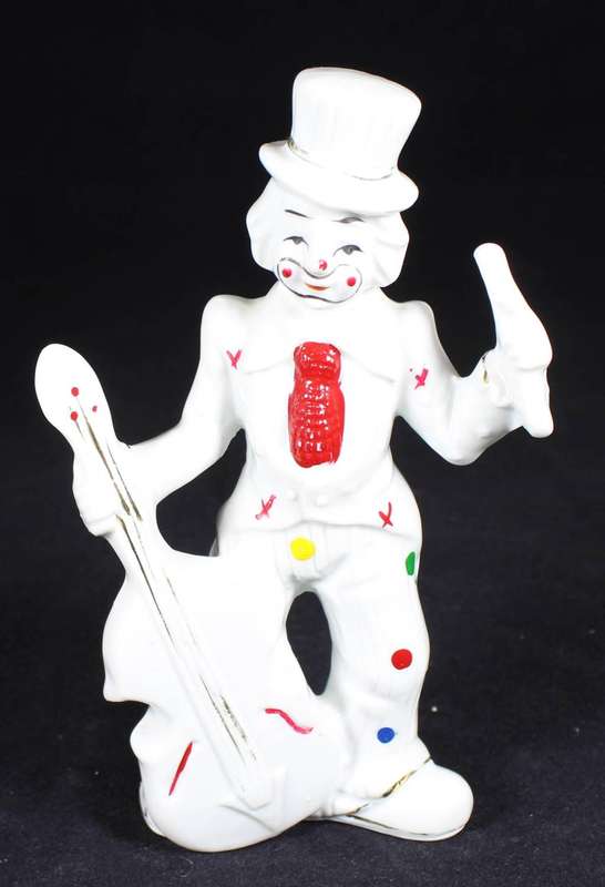 Porcelain clown with double bass