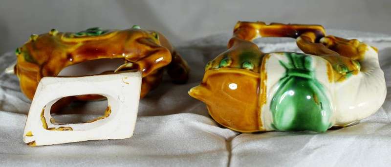 Pair of Chinese style horses with satchel