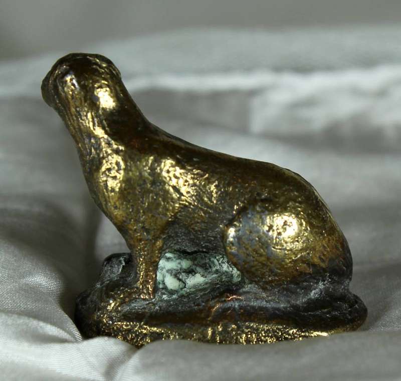 Brass honey badger