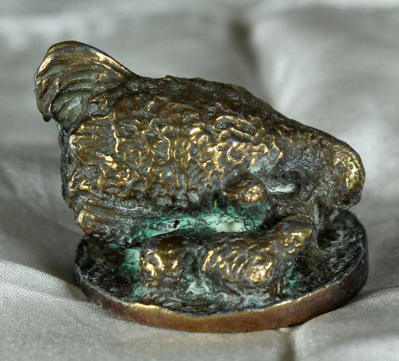 Brass hen with chicks