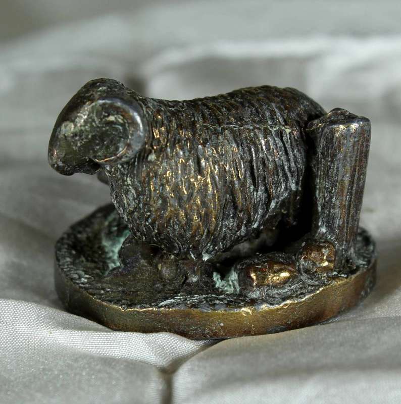Brass ram with lamb