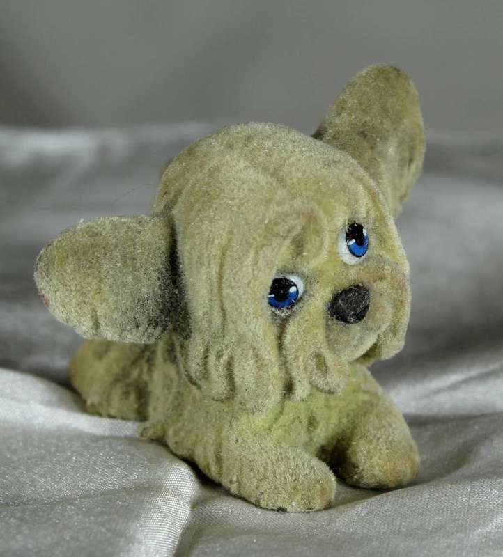 Puppy in my pocket families - puppy with sad face and ears up
