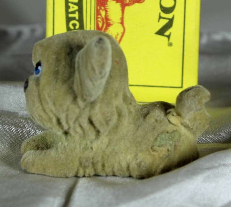 Puppy in my pocket families - puppy with sad face and ears up