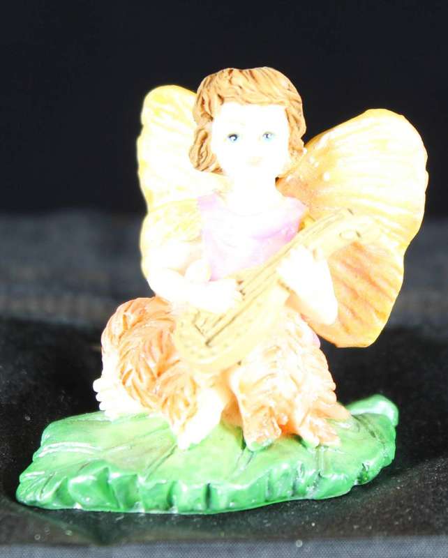Flower fairy - peach wings - playing lute