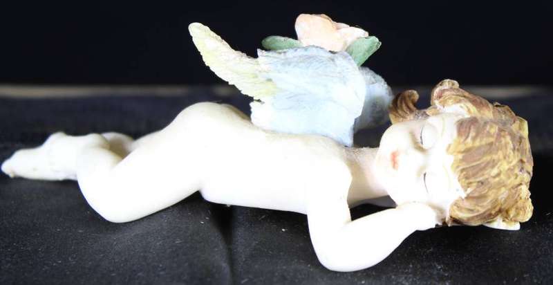 Angel child sleeping - naked