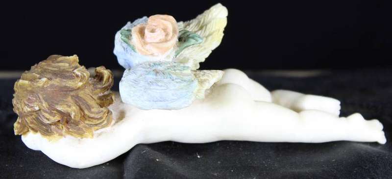 Angel child sleeping - naked