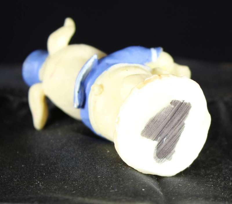 Miniature piggy with map and magnifying glass