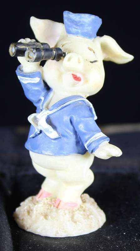 Miniature piggy with binoculars