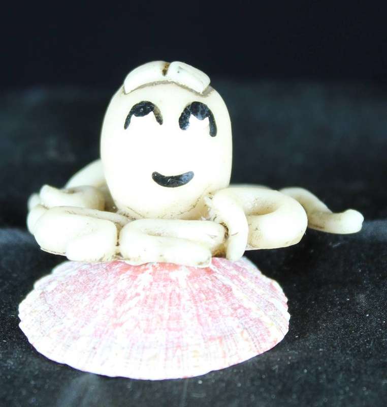 Octopus ornament on shell