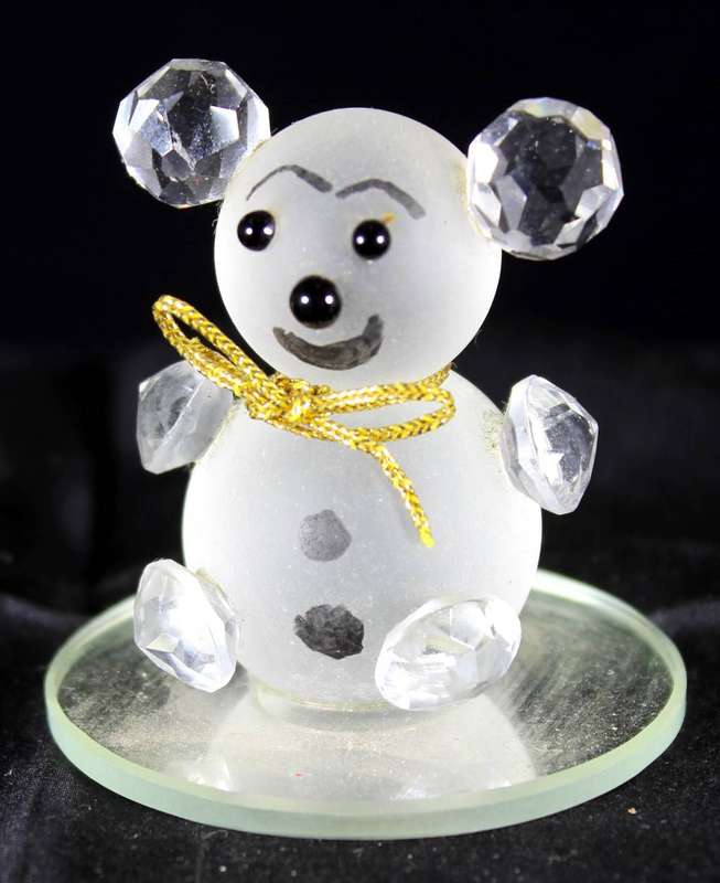 Glass bear on mirror