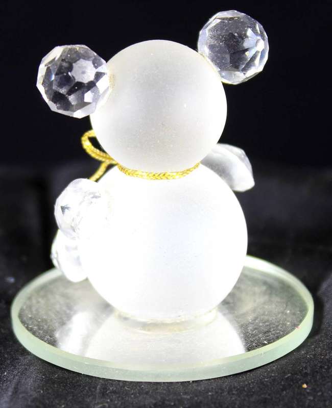 Glass bear on mirror