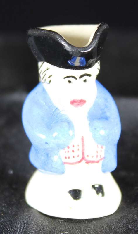 Miniature character jug - man with blue jacket