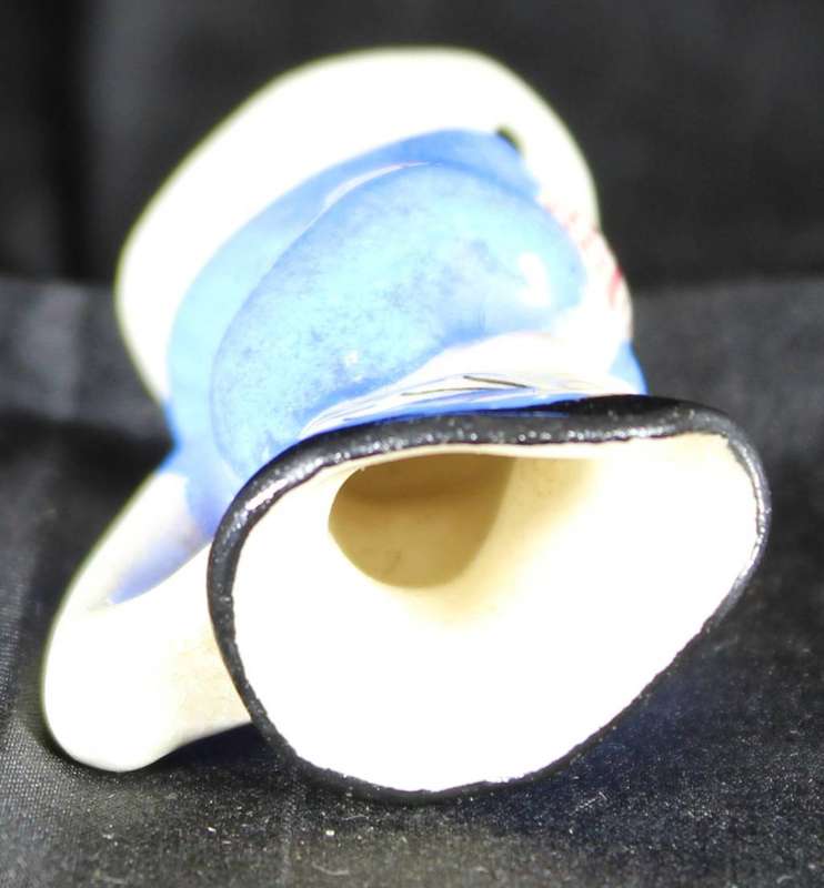 Miniature character jug - man with blue jacket