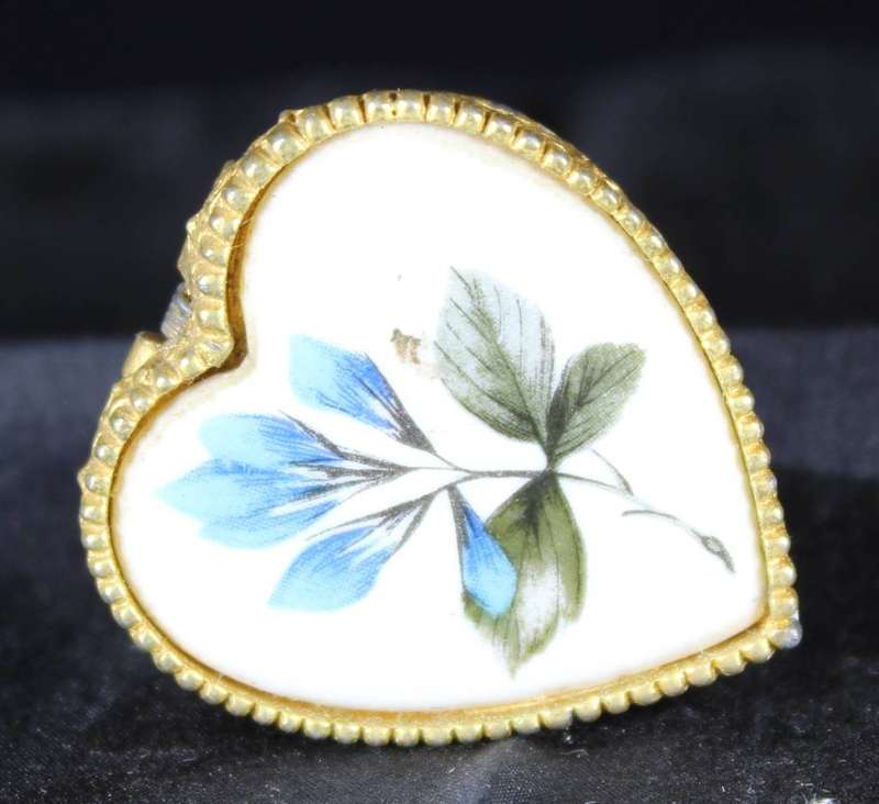 Heart shape pill box with flower