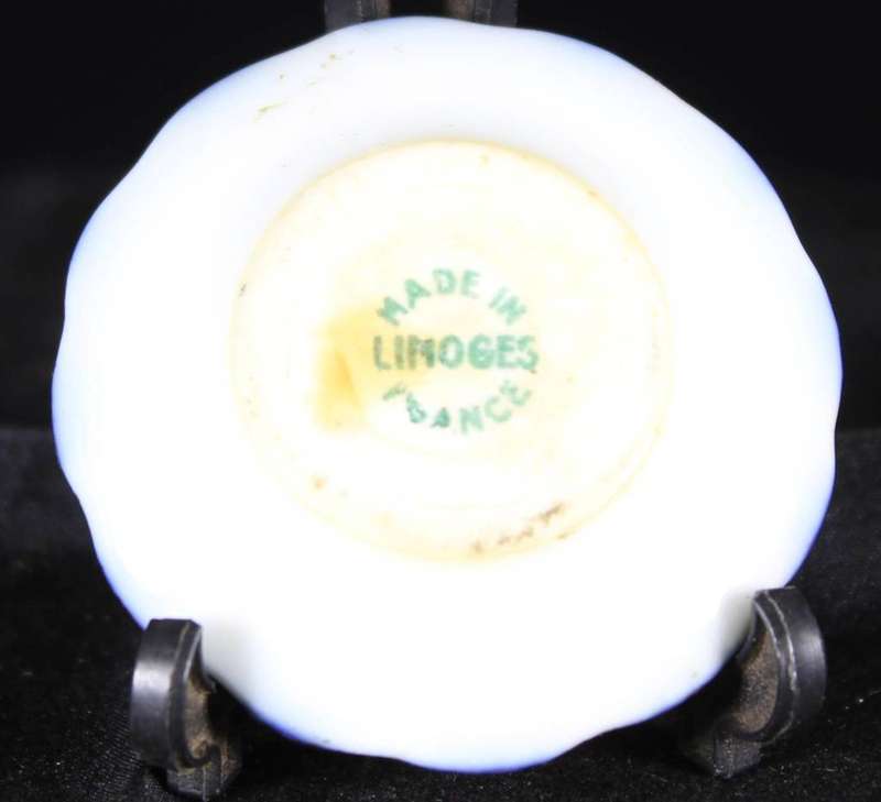 Miniature limoges plate with Victorian couple