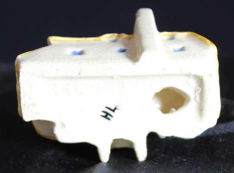 Miniature house with embossed paint