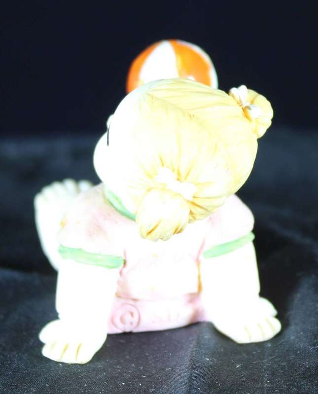 Vintage molded & hand painted little girl with ball