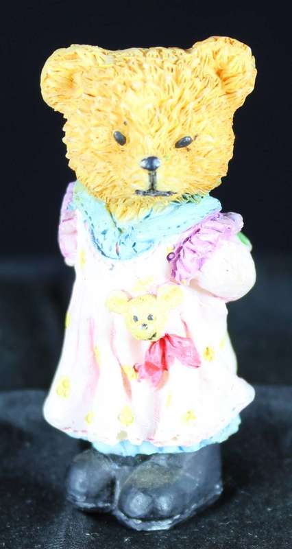 Little bear girl with rose