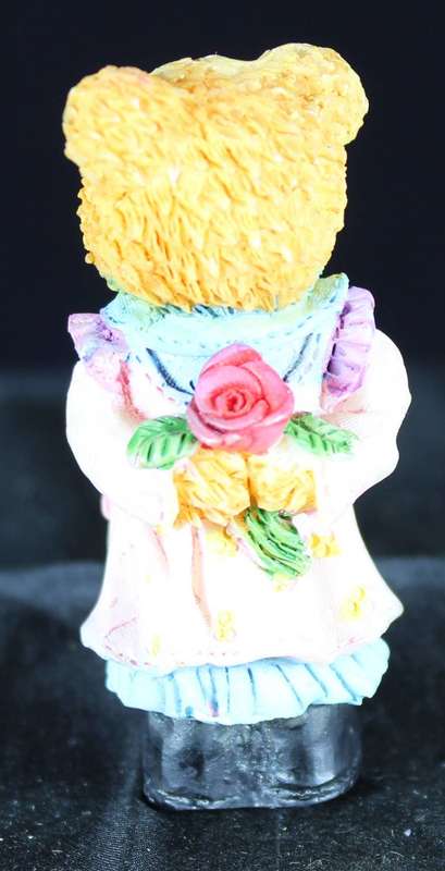 Little bear girl with rose