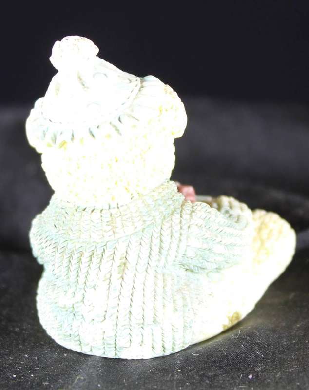 Little bear girl with hat and present