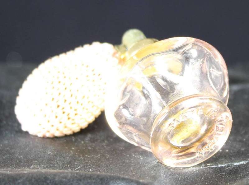 Vintage pink perfume bottle with atomizer