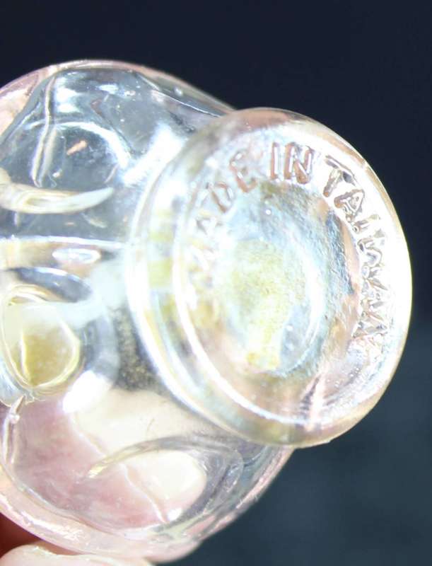 Vintage pink perfume bottle with atomizer