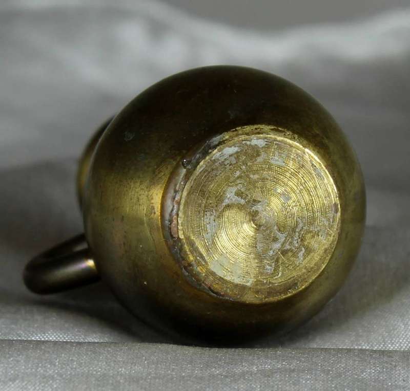 Miniature brass water jug