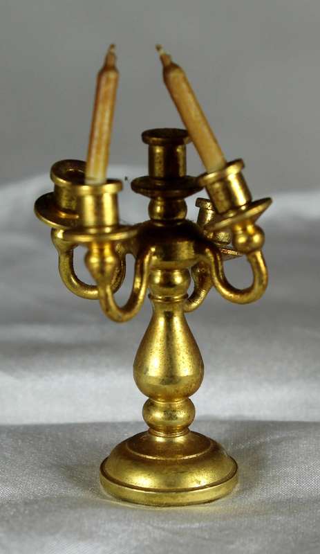 Miniature brass candelabra with two candles