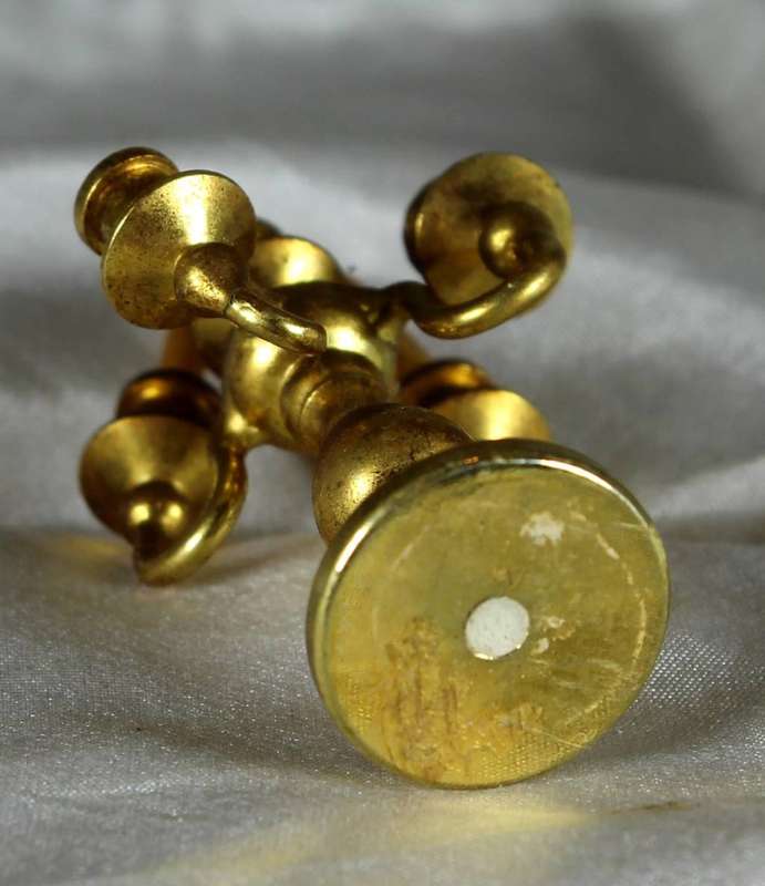 Miniature brass candelabra with two candles