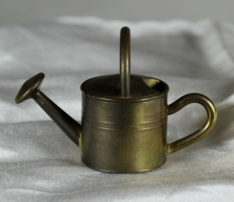 Miniature brass watering can