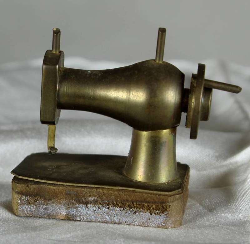 Miniature brass sewing machine