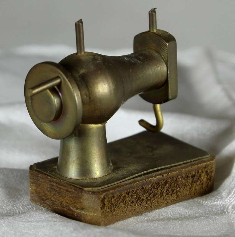 Miniature brass sewing machine
