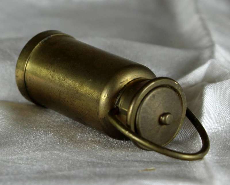 Miniature brass lidded container