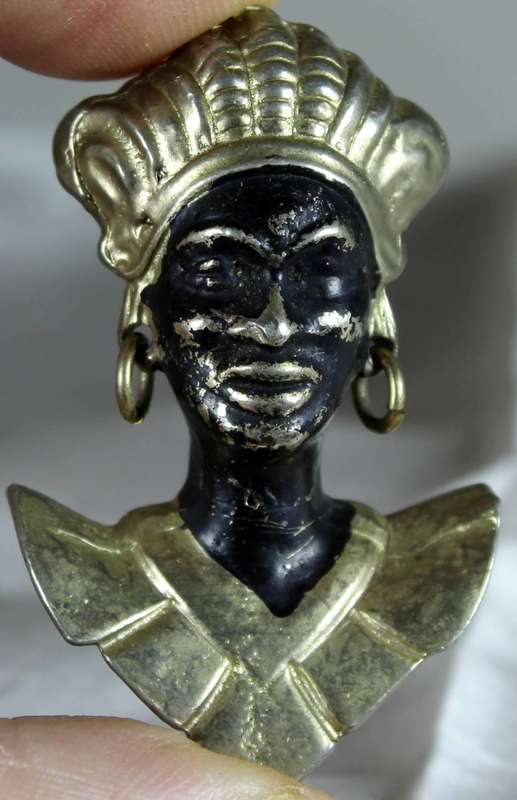 Metal traditional face pendant