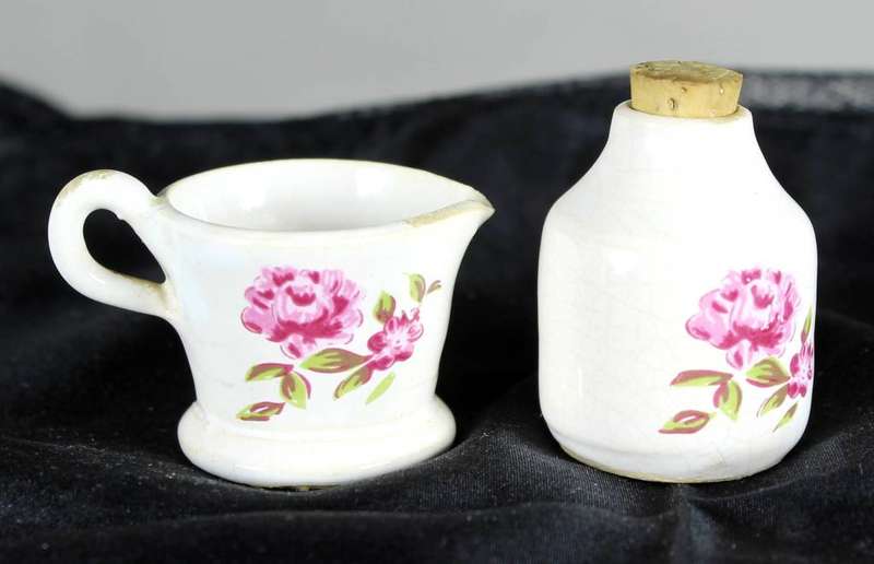 Miniature porcelain - pair of jugs with pink flowers