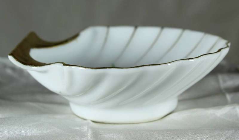 Small white shell trinket bowl with painted flowers